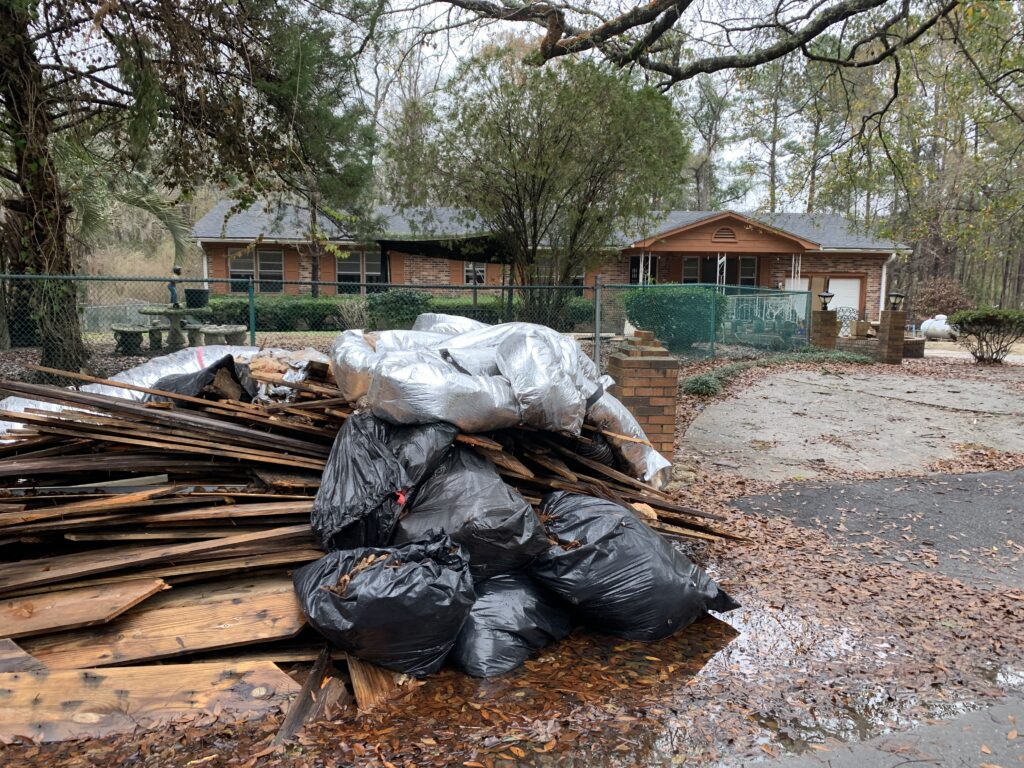 Trash outside of fence